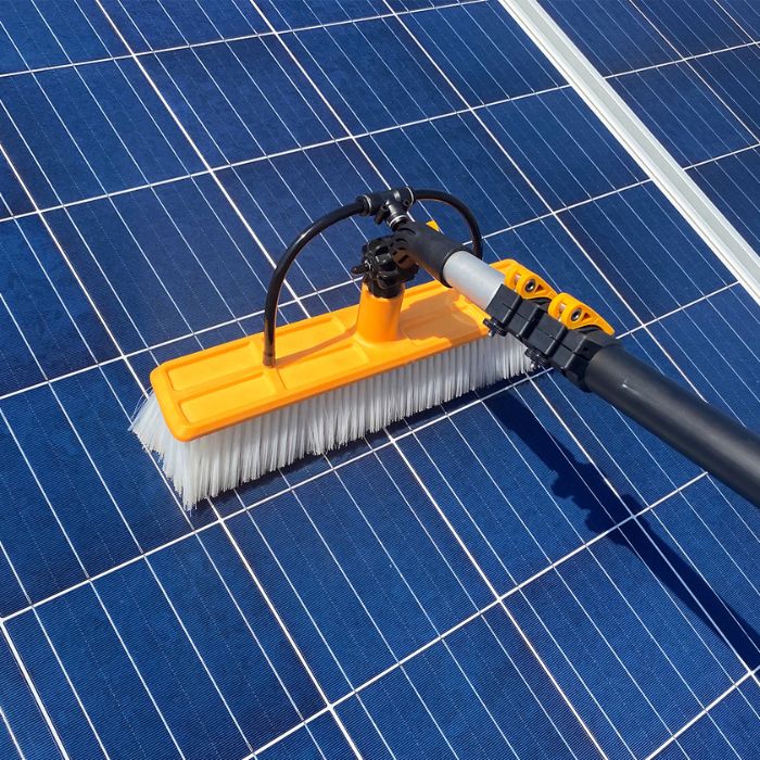 Solar-panel-Cleaning-brush-on-blue-solar-panel